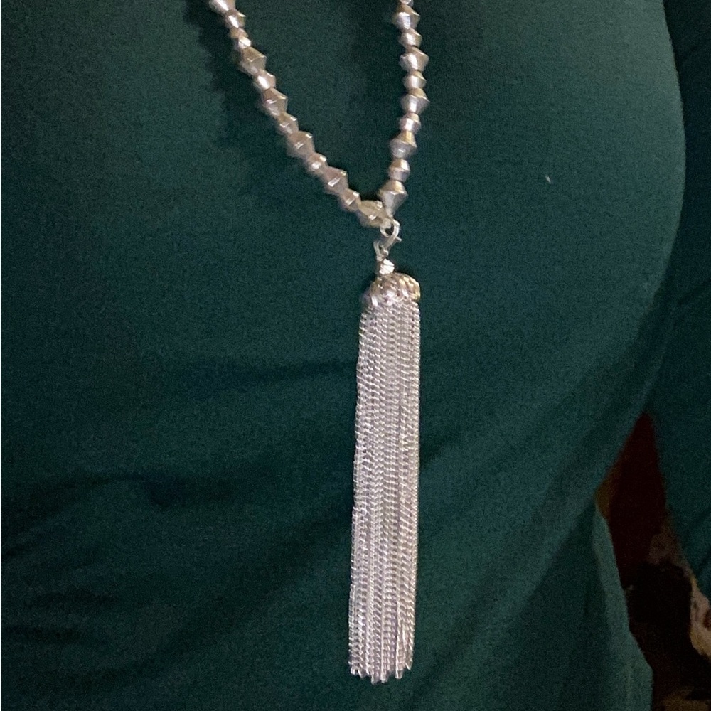 Beautiful long silver necklace.